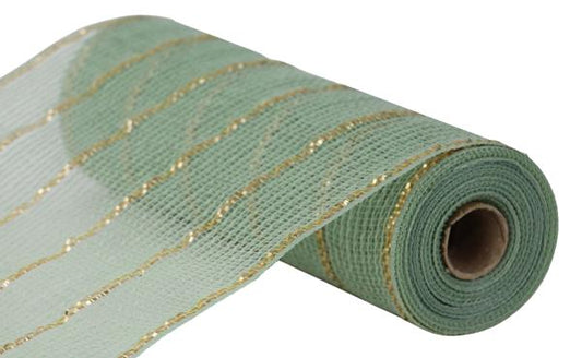 a roll of green and gold glitter fabric