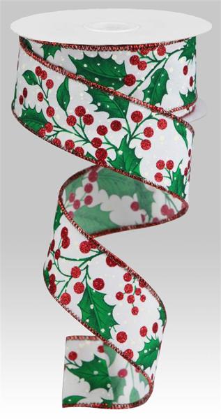 a roll of christmas ribbon with holly and berries on it