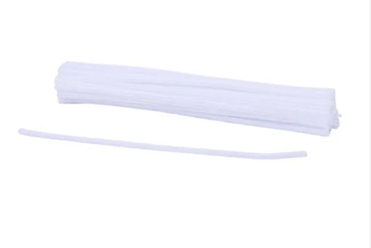 A bundle of white, flexible plastic tubes or pipes.