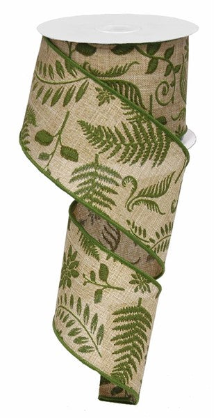 a roll of ribbon with a fern design on it