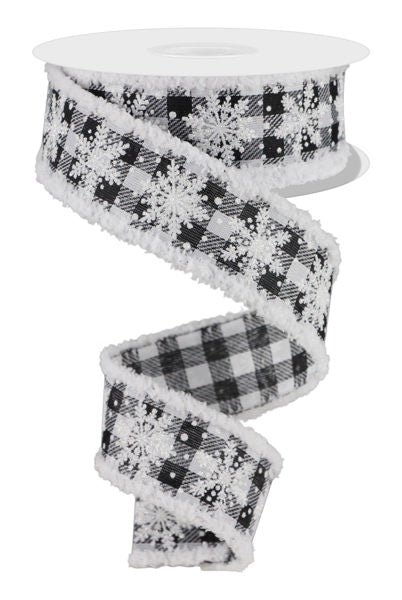 a black and white ribbon with snowflakes on it