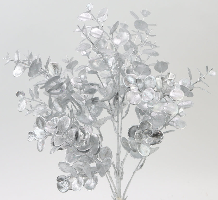 A silver-colored artificial plant with numerous small, round leaves arranged in a cluster.
