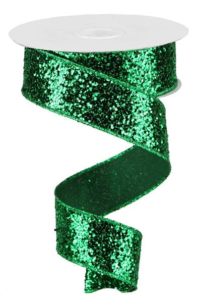 a roll of green glitter ribbon on a white background