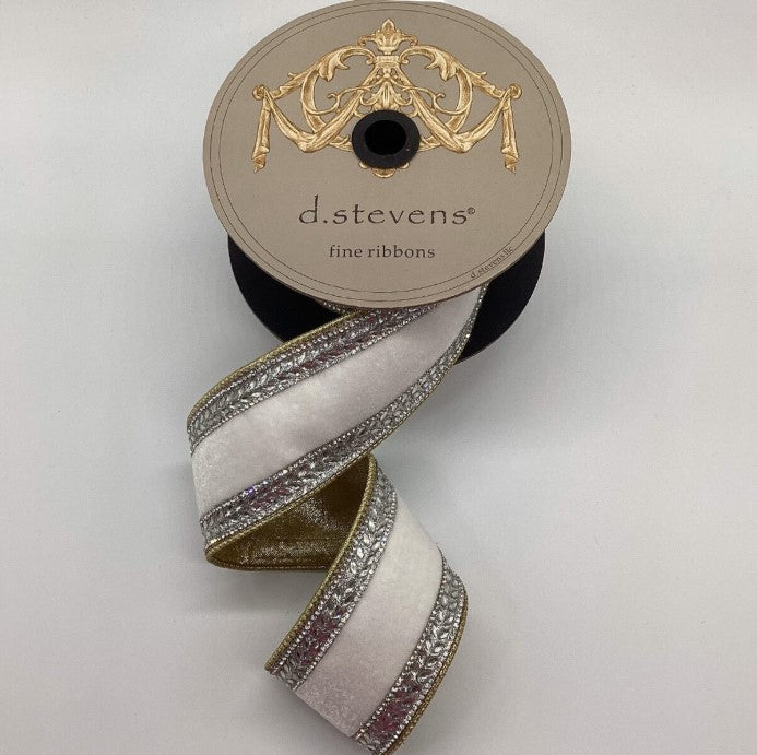 A roll of decorative ribbon with a gold and white pattern, featuring a decorative design on the top.