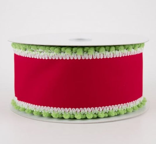 a red and green ribbon with white trim