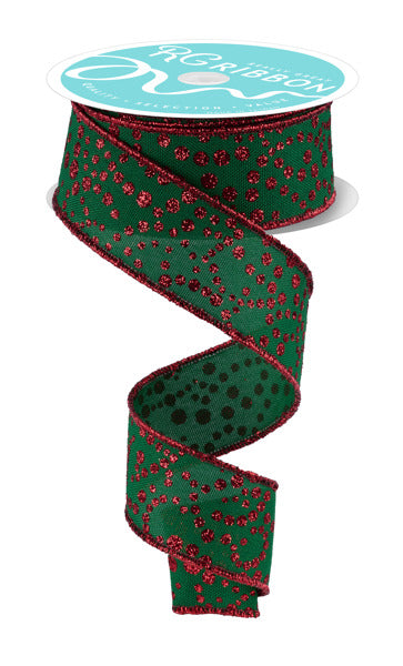 A spiral-shaped green and red ribbon with a pattern of small red dots on a white background.