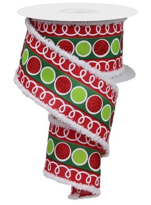 A decorative red and green ribbon with a repeating pattern of circles and swirls.