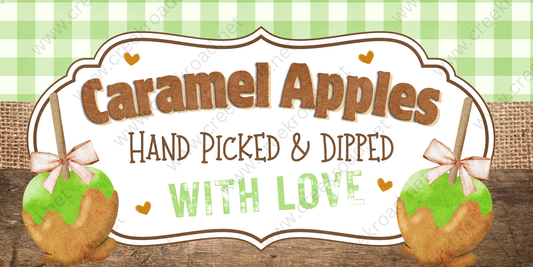 a sign for "Caramel Apples" that reads "Hand Picked & Dipped with Love". The sign is set against a green and white checkered background, and there are two caramel apples on either side of the sign, each with a bow on top.