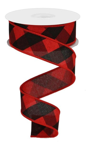 a red and black plaid ribbon on a white background