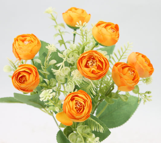 a bunch of orange flowers in a vase