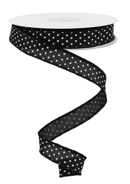 a black and white polka dot ribbon on a white background