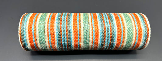 a roll of multicolored ribbon on a gray surface