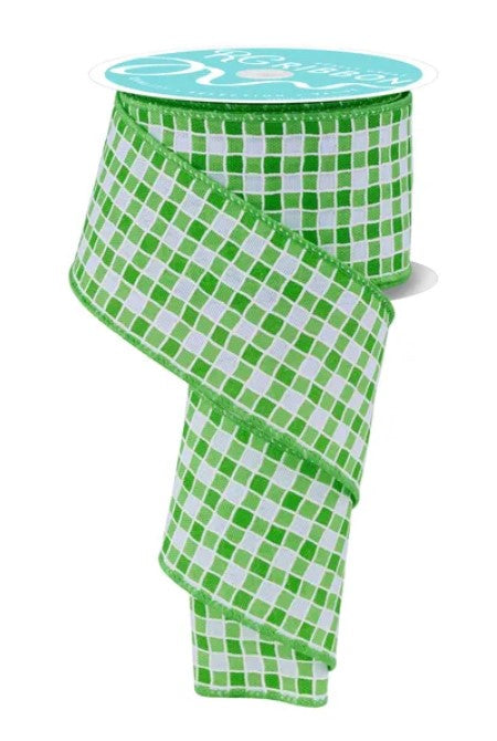 a green and white checkered pattern ribbon, which is a decorative item.