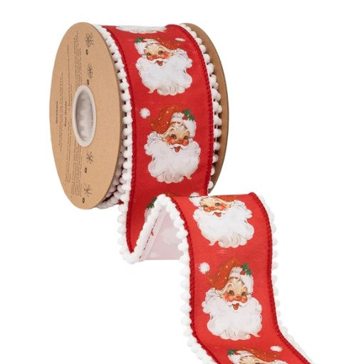 A roll of red ribbon with a repeating pattern of Santa Claus faces on it.