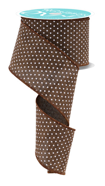 a brown and white polka dot ribbon with a turquoise label.