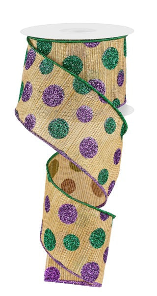 a roll of purple and green polka dot ribbon