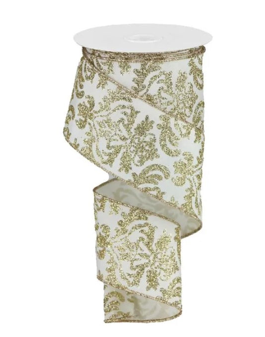 a white and gold floral patterned ribbon.